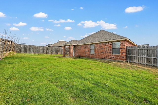 view of yard featuring a fenced backyard