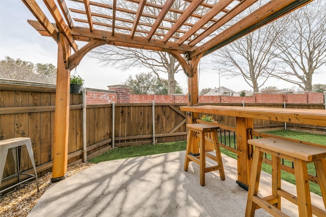 view of patio featuring a fenced backyard and a pergola