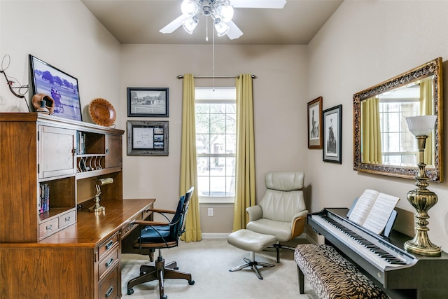 home office with carpet floors, plenty of natural light, baseboards, and a ceiling fan