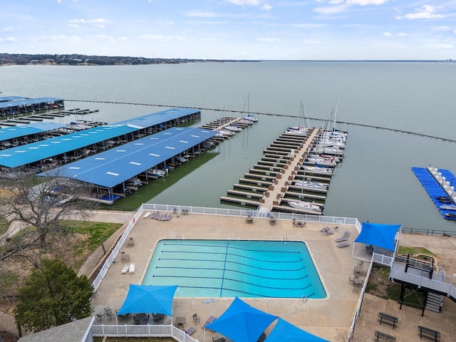 birds eye view of property featuring a water view