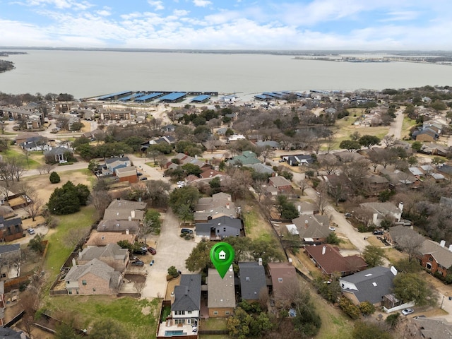 aerial view featuring a water view and a residential view