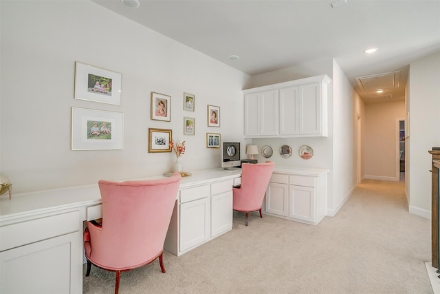 office featuring light carpet, attic access, baseboards, built in desk, and recessed lighting