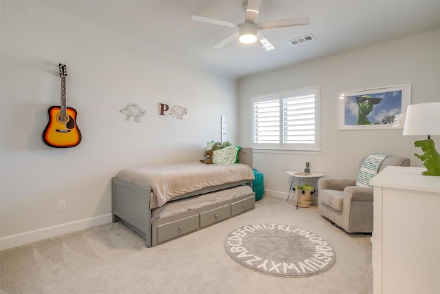 carpeted bedroom with ceiling fan, visible vents, and baseboards