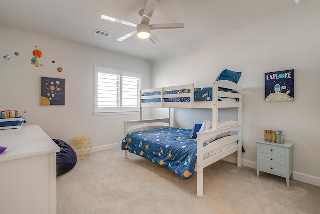 carpeted bedroom featuring visible vents, ceiling fan, and baseboards