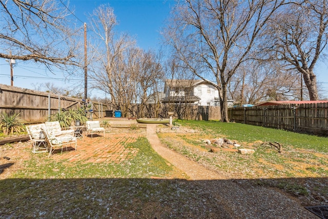 view of yard with a fenced backyard