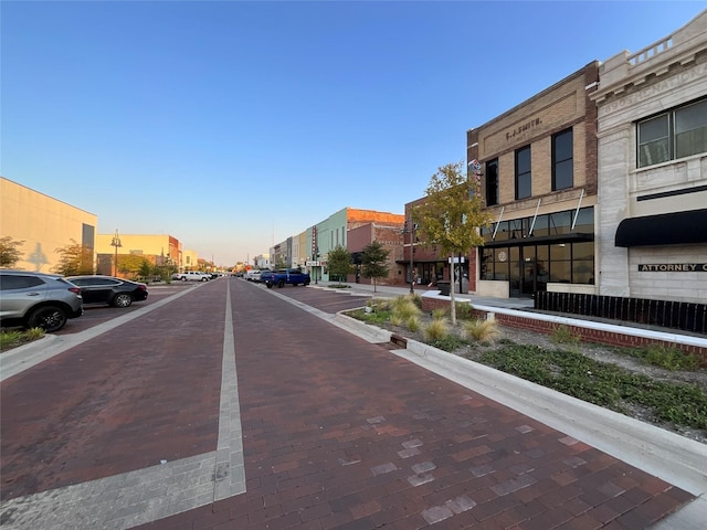 view of street featuring curbs