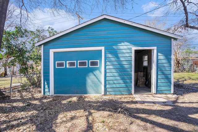 garage featuring fence