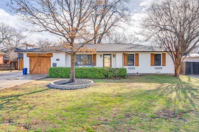 ranch-style house featuring a shingled roof, crawl space, fence, a front yard, and brick siding