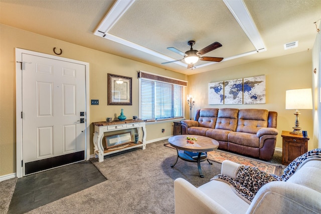 107 S Graves St, Mckinney, TX 75069 - living area featuring carpet, a ceiling fan, a textured ceiling, and baseboards