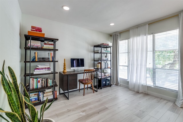 office with baseboards, wood finished floors, and recessed lighting