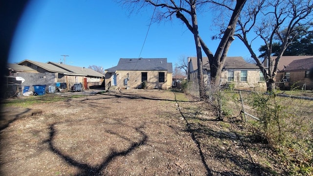 1227 Harlandale Ave, Dallas, TX 75216 - rear view of house with fence