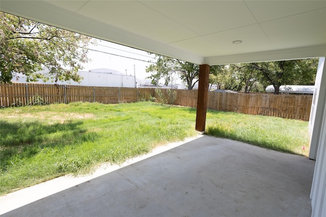 view of yard with a fenced backyard and a patio