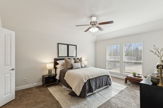 bedroom with carpet, a ceiling fan, and baseboards