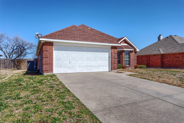 single story home with driveway, fence, cooling unit, a garage, and brick siding