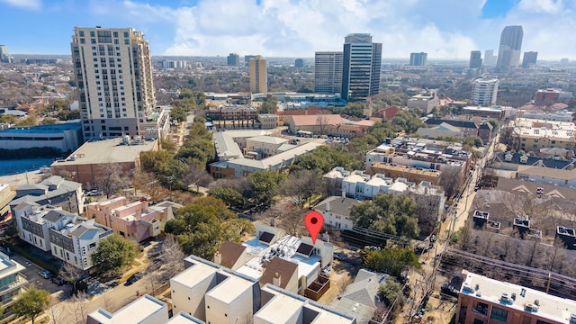 birds eye view of property featuring a view of city