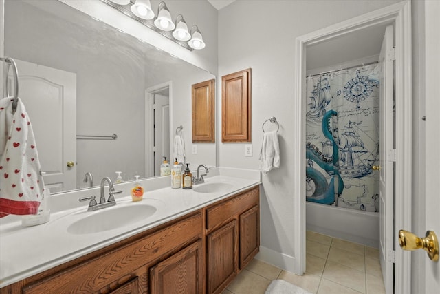 bathroom with double vanity, shower / bath combo with shower curtain, a sink, and tile patterned floors