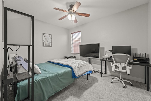 bedroom featuring ceiling fan, carpet floors, and baseboards