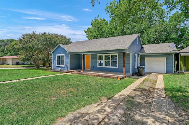 ranch-style home with driveway, a garage, a shingled roof, a porch, and a front yard