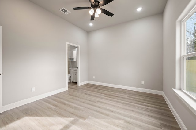 empty room featuring light wood finished floors, recessed lighting, visible vents, ceiling fan, and baseboards