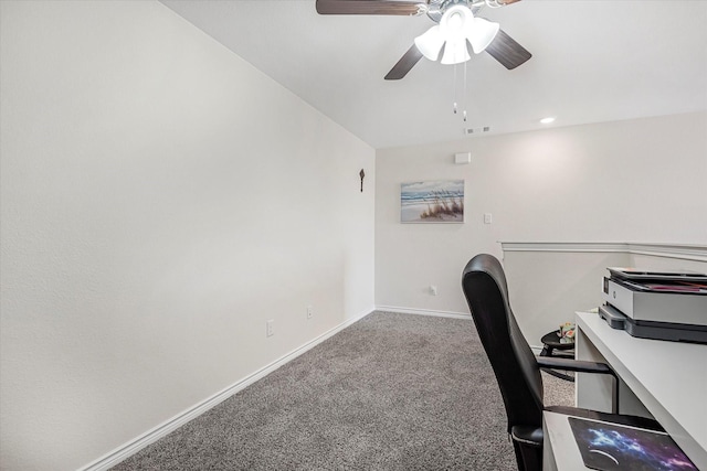 unfurnished office with a ceiling fan, carpet, visible vents, and baseboards