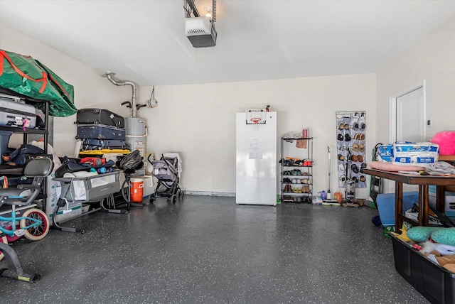 garage featuring a garage door opener, gas water heater, and freestanding refrigerator