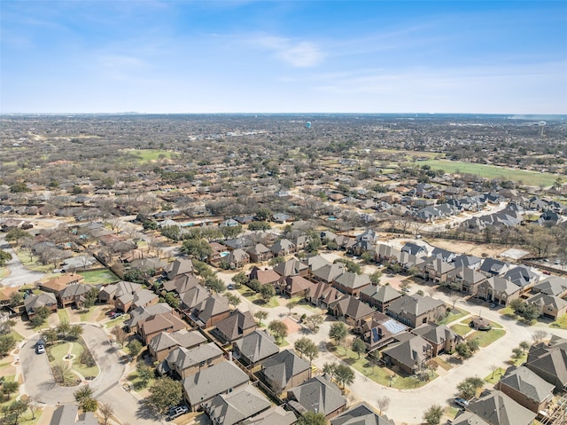 birds eye view of property with a residential view