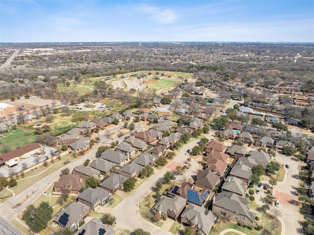 birds eye view of property with a residential view