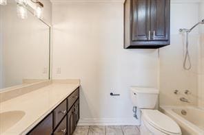 bathroom featuring toilet, bathtub / shower combination, baseboards, and vanity