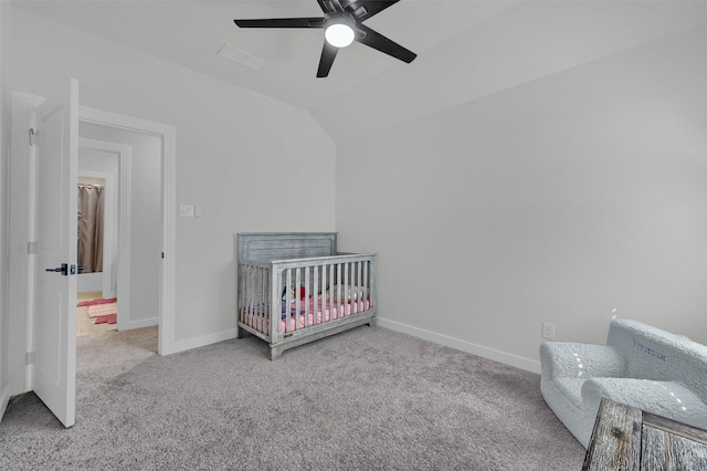 bedroom featuring carpet floors, ceiling fan, baseboards, and lofted ceiling