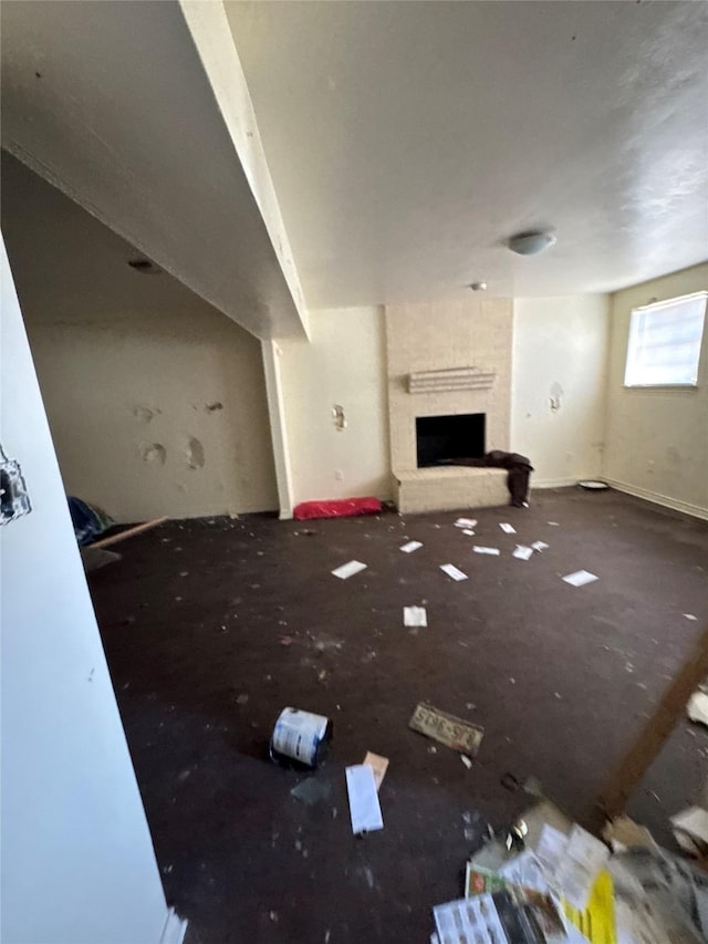 unfurnished living room with a fireplace