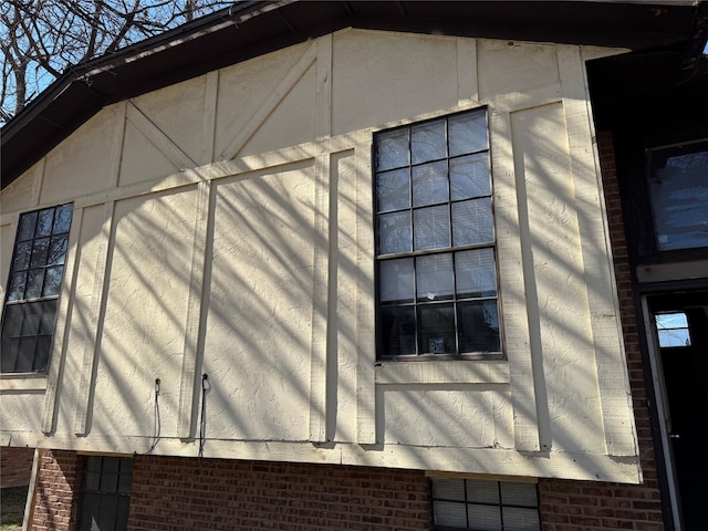 view of side of home featuring crawl space