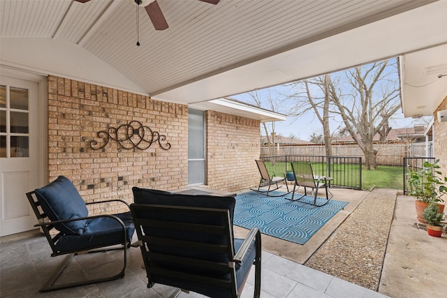 view of patio / terrace with a fenced backyard and a ceiling fan