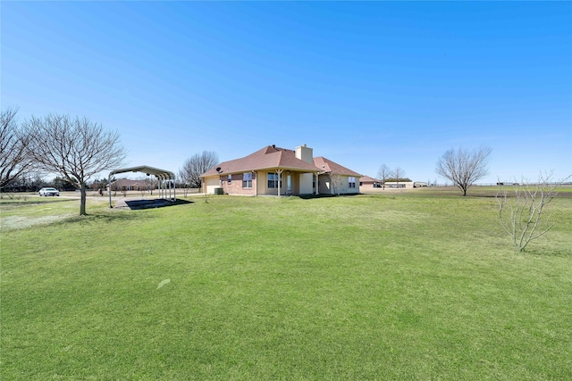 view of yard featuring a carport