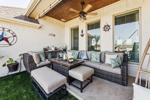 view of patio / terrace featuring ceiling fan and an outdoor living space