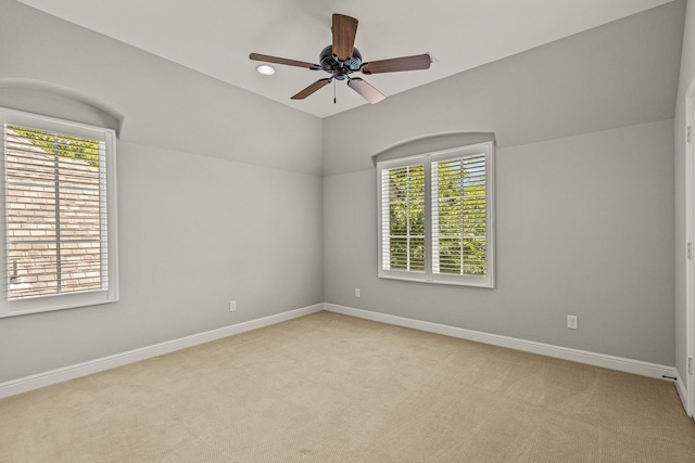 unfurnished room with recessed lighting, a ceiling fan, baseboards, and light carpet