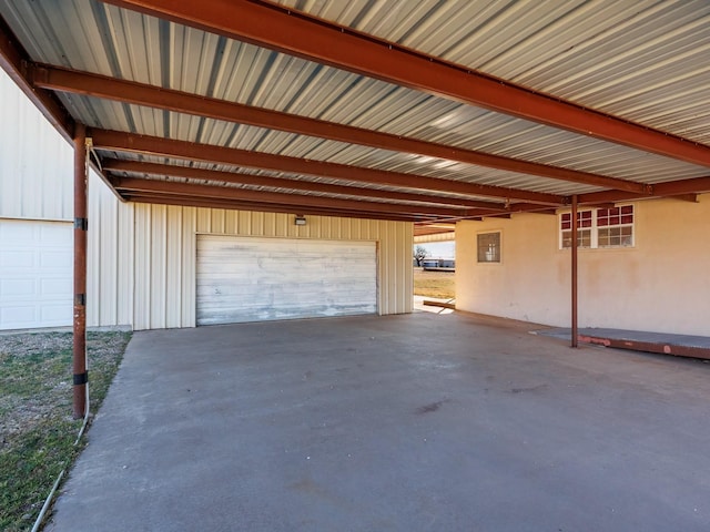 garage with a carport