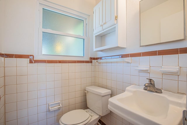 bathroom featuring toilet and a sink