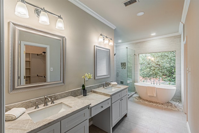 full bath with crown molding, a sink, visible vents, and a shower stall