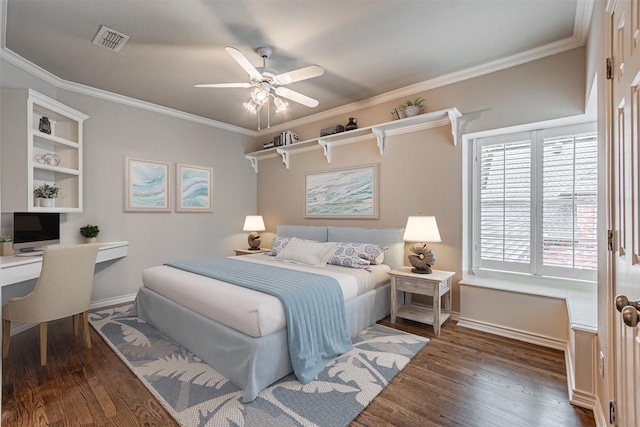 bedroom with visible vents, wood finished floors, and ornamental molding