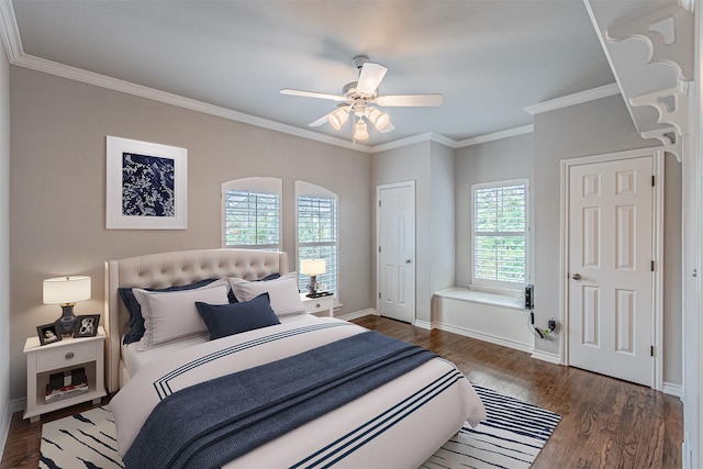 bedroom with ceiling fan, ornamental molding, wood finished floors, and baseboards