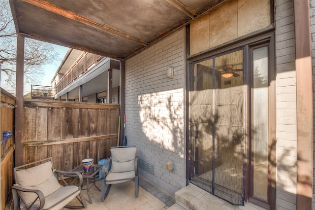 view of patio / terrace featuring fence