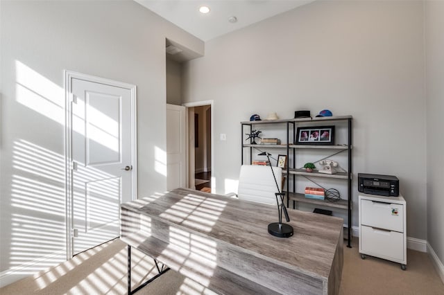 office space with light carpet, recessed lighting, and baseboards