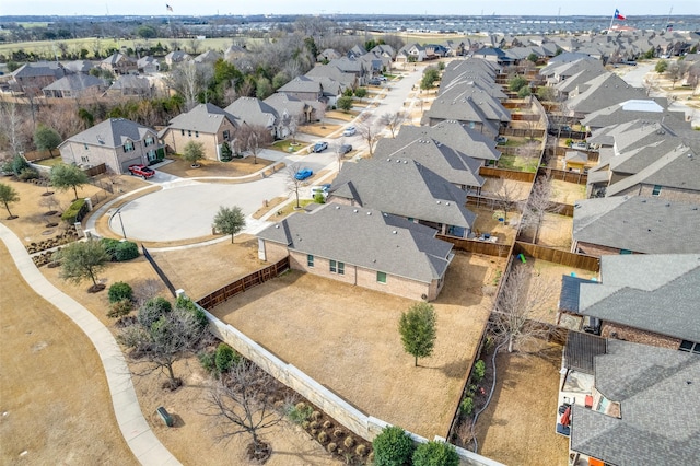 birds eye view of property with a residential view