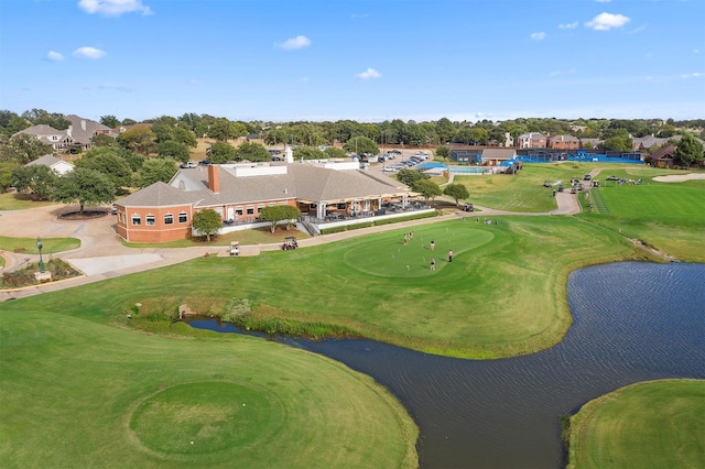 aerial view with view of golf course and a water view