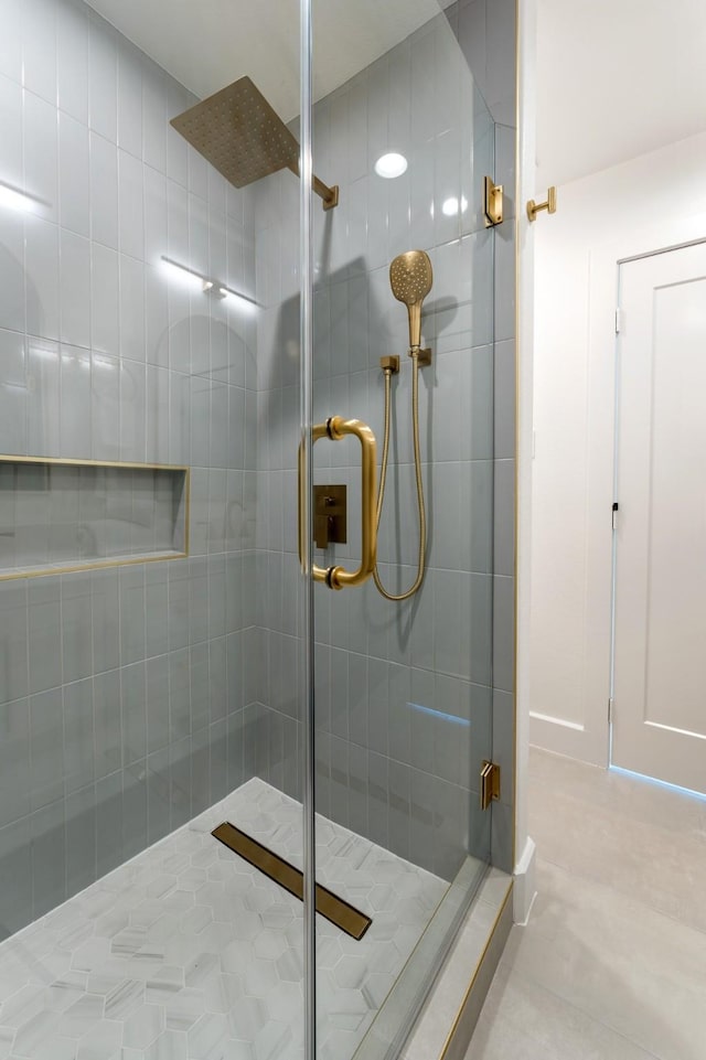 full bathroom featuring a shower stall