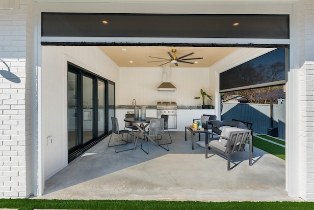 view of patio / terrace with outdoor dining space, fence, a ceiling fan, and area for grilling