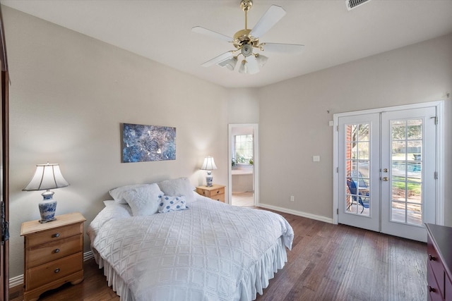 bedroom with wood finished floors, baseboards, access to exterior, french doors, and ensuite bathroom