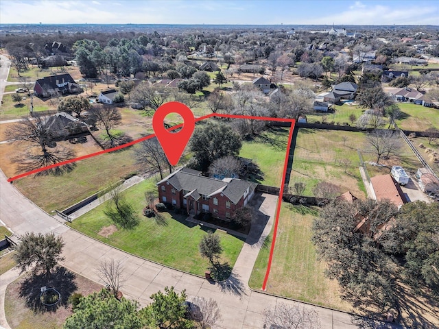 birds eye view of property with a rural view