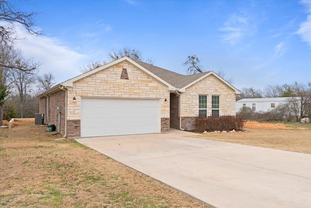 ranch-style house featuring driveway, an attached garage, a front lawn, and roof with shingles