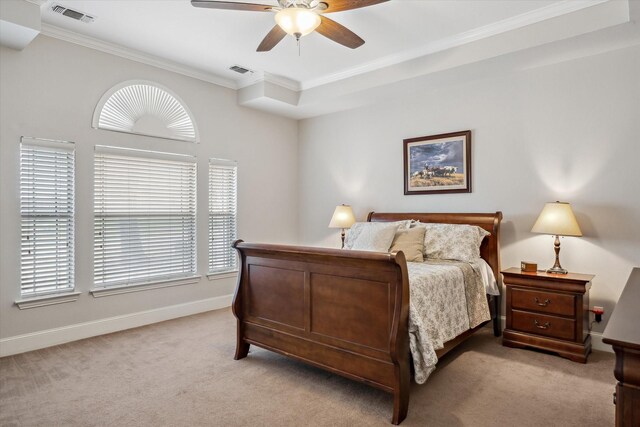 bedroom featuring light carpet, visible vents, and ornamental molding